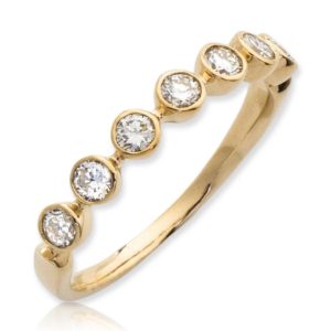 14KY 0.50CTW DIAMOND BAND - 7 STONE BEZEL SET