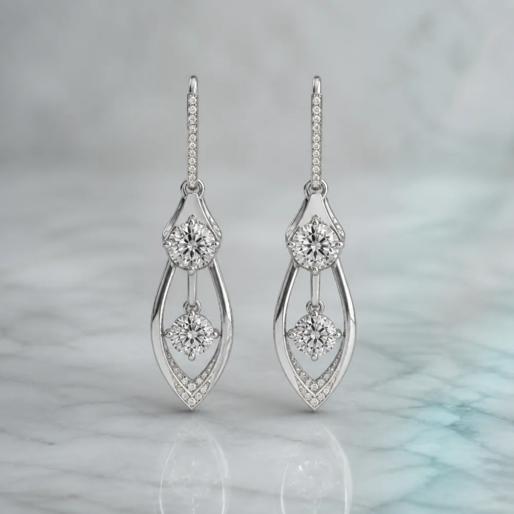 Diamond drop earrings on pale stone